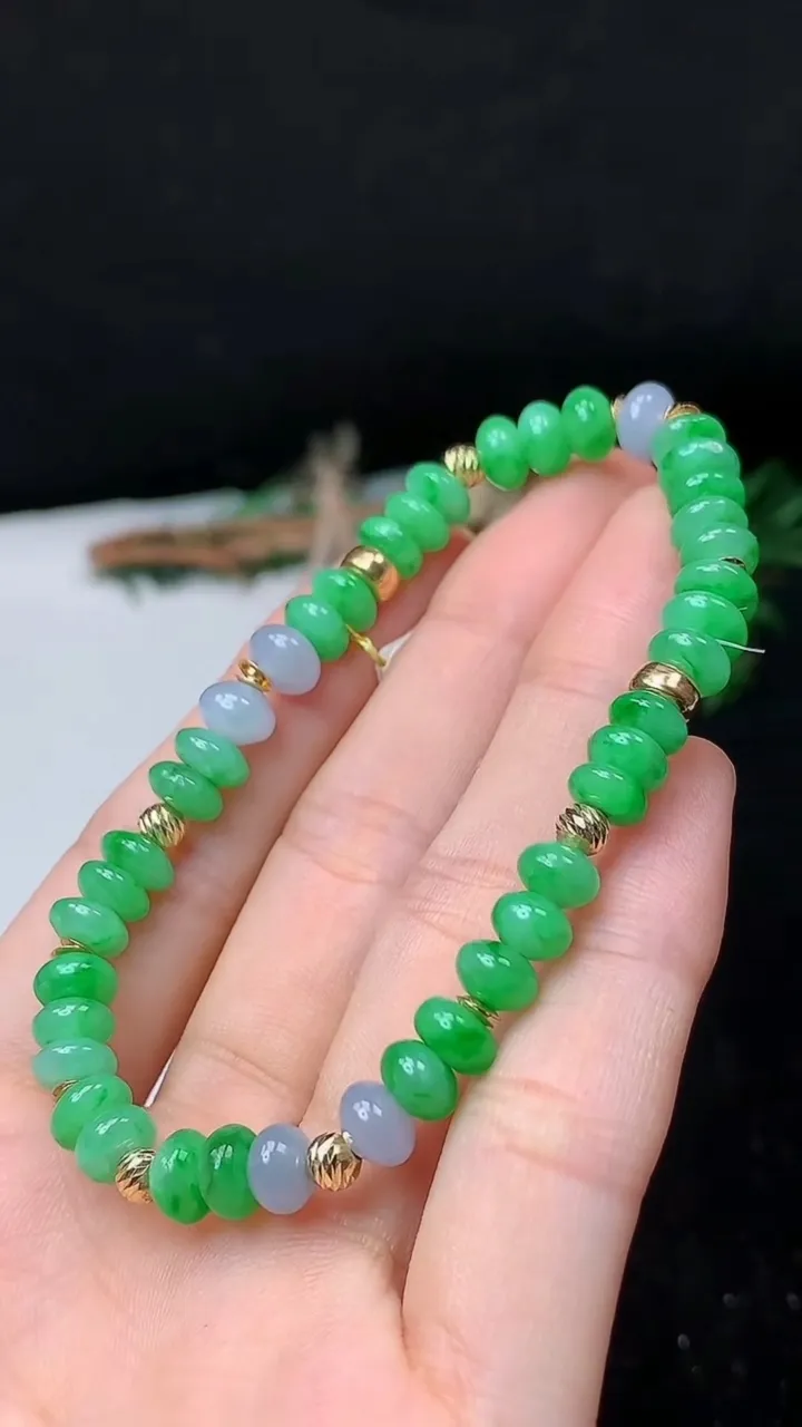 天然A货翡翠k金双彩算盘珠手串，尺寸6.6-4-41颗，重量:12.18g10月24日
工厂直销收藏佳品,种好水足，色泽均匀，有种有色，上手高大气！