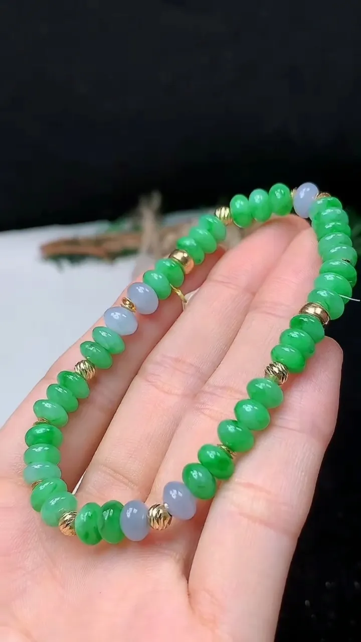 天然A货翡翠k金双彩算盘珠手串，尺寸6.6-4-41颗，重量:12.18g10月24日
工厂直销收藏佳品,种好水足，色泽均匀，有种有色，上手高大气！