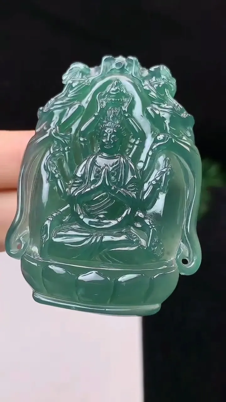 天然A货翡翠蓝水千手观音吊坠，尺寸57.4-41-6.5，重量:26.88g
10月27日