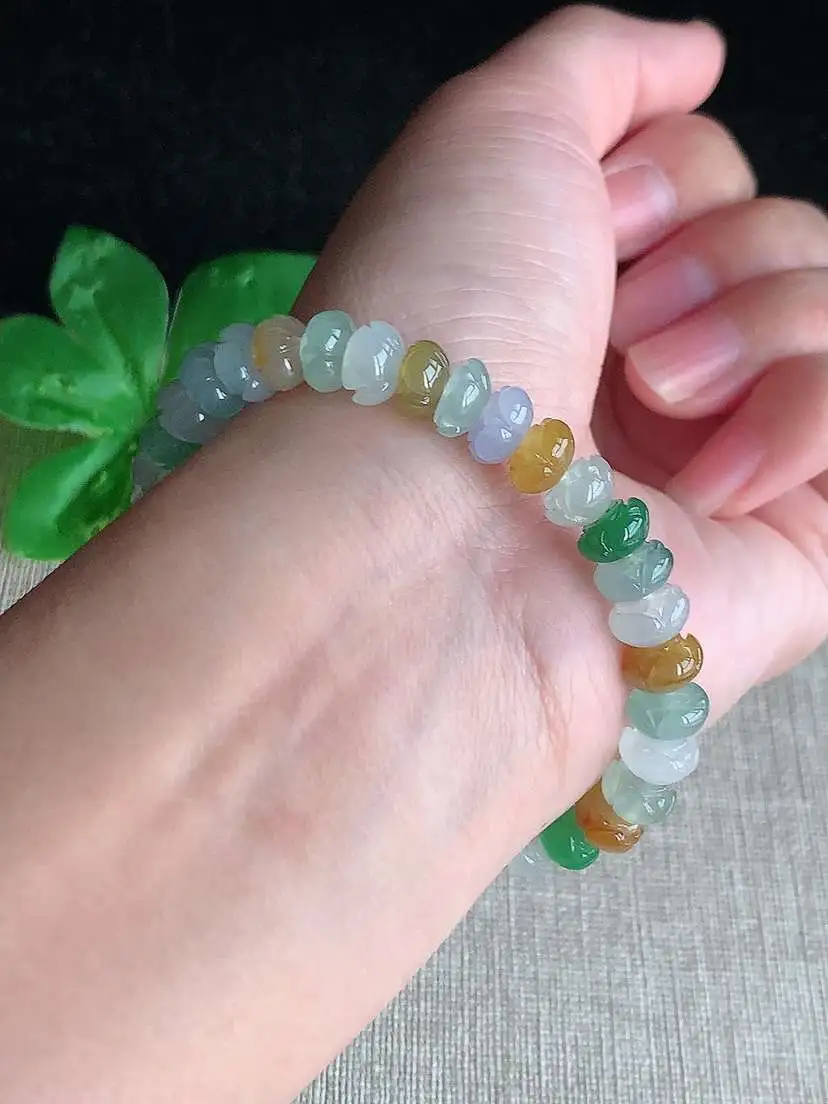 a货翡翠老坑冰种多彩莲蓬手串36颗  尺寸7×4.7mm 重量17.56g 1028