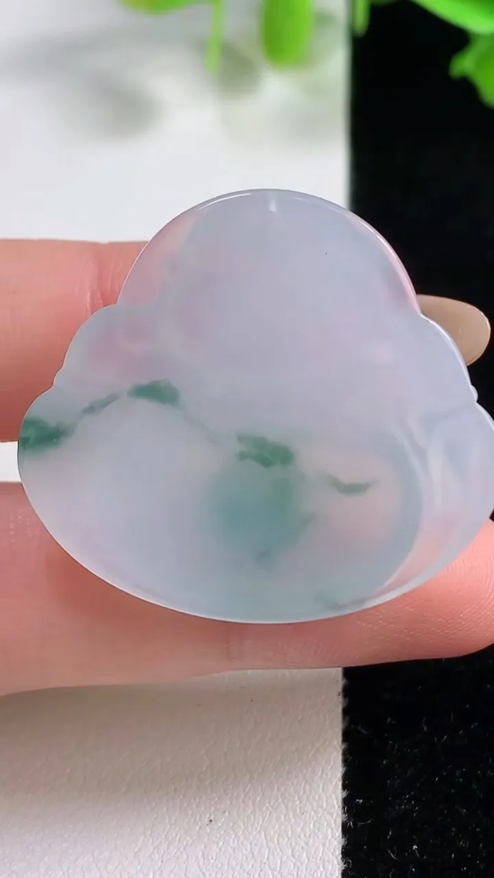 天然A货翡翠冰种飘花佛公镶嵌件，尺寸31.5-35.2-5.9，重量:10.92g
10月29日