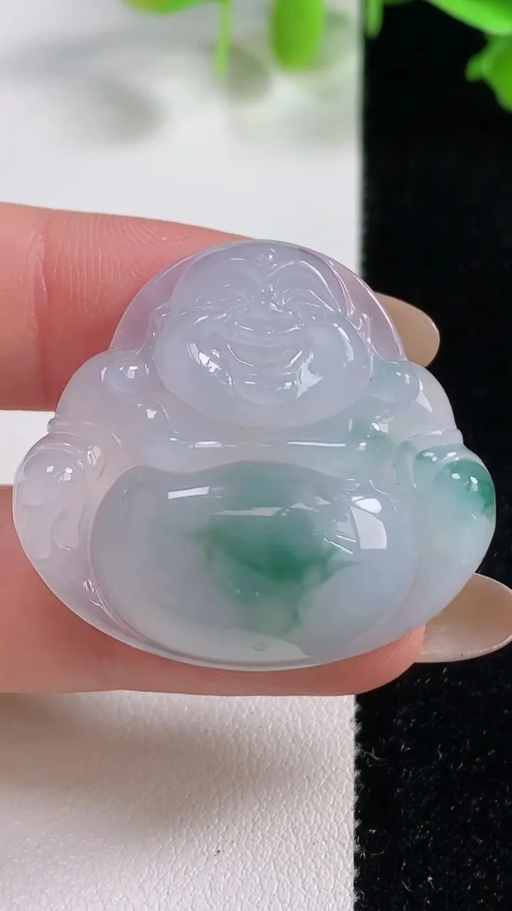 天然A货翡翠冰种飘花佛公镶嵌件，尺寸31.5-35.2-5.9，重量:10.92g
10月29日