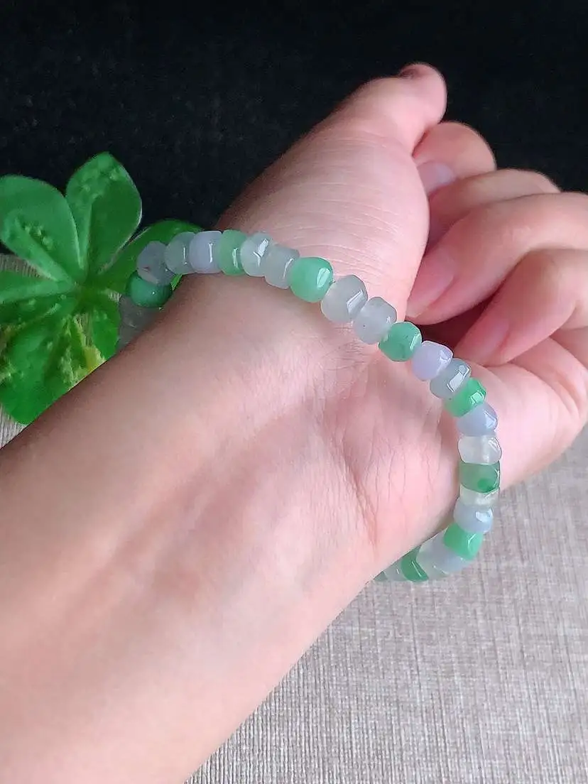 a货翡翠老坑冰种多彩随形手串  尺寸5.8×3mm 重量14.48g 1029