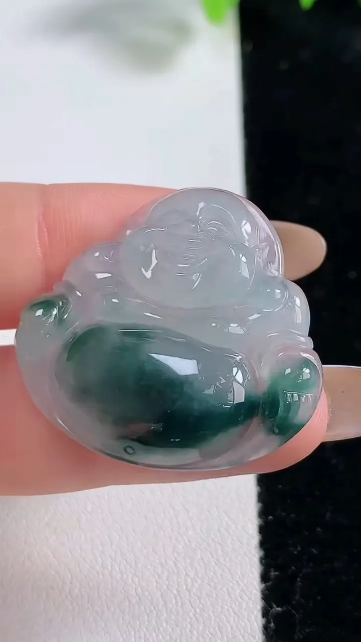 天然A货翡翠冰种飘花佛公吊坠，尺寸29.5-32.2-5.5，重量:7.11g
10月31日