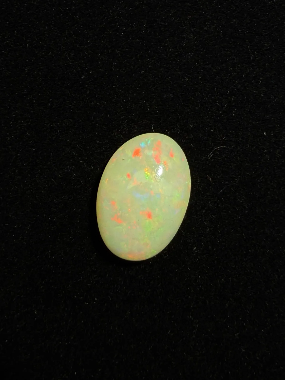 6.22ct天然彩欧泊裸石，尺寸17*12*6.3mm，颜色美艳，油画般色彩，火彩足。