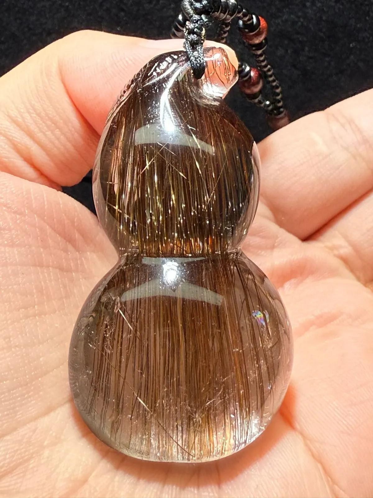 天然水晶铜发晶葫芦，造型霸气，晶体通透，效应超闪葫芦寓意福禄吉祥，招财力量非常强大，性价比超高的一款值得收藏，规格：61.1*34.1*21.8mm