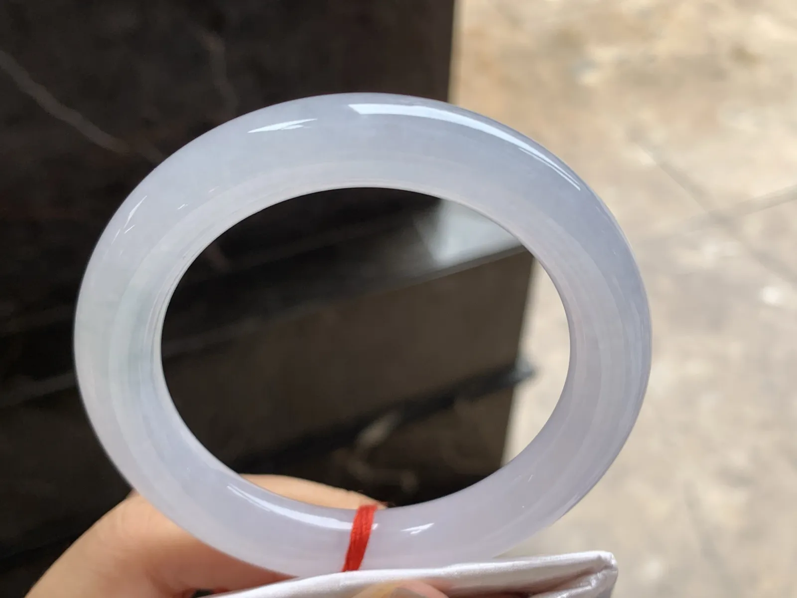 55-10.8

冰紫圆条手镯^_^荧光十足 透亮