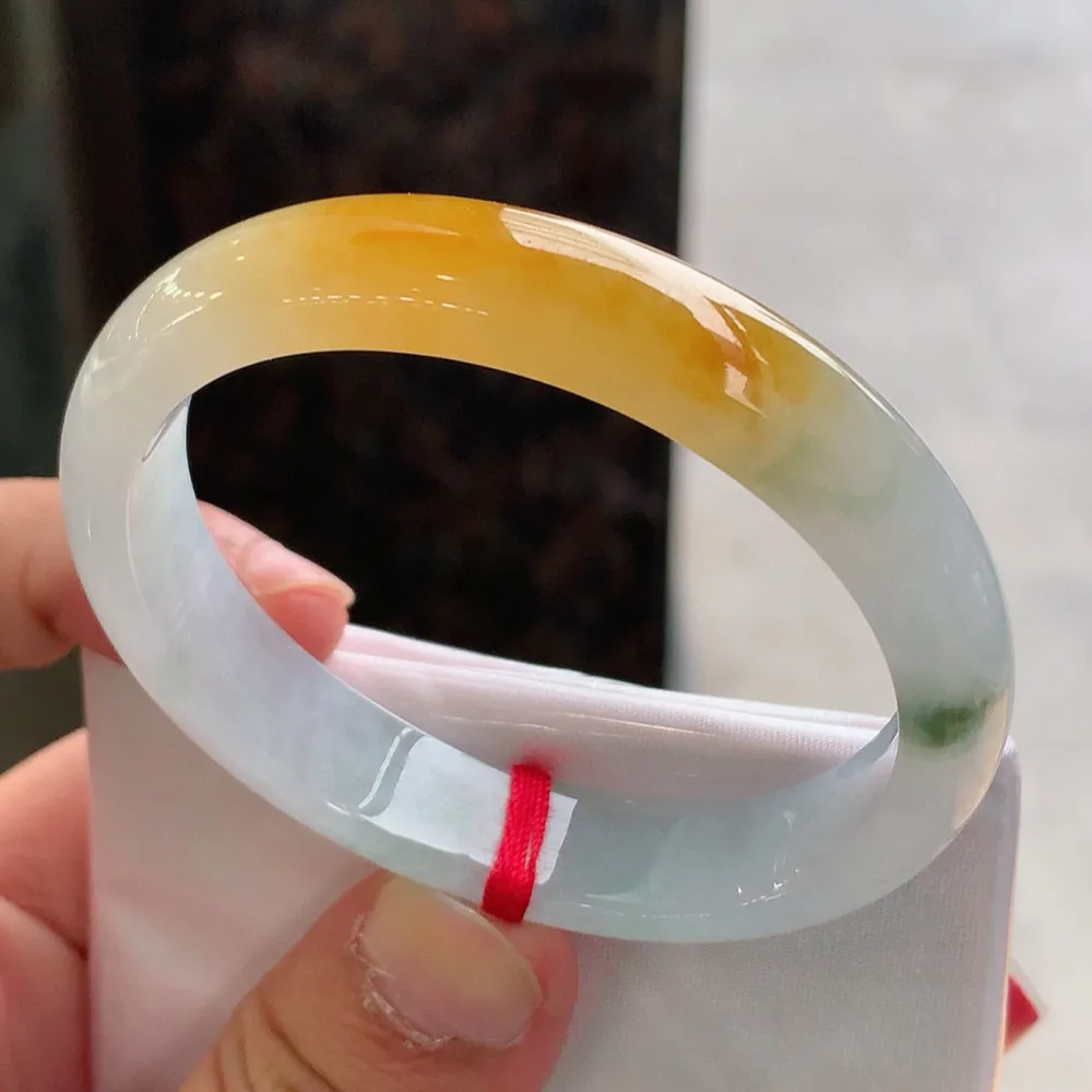 贵妃高冰黄翡飘花 无瑕 尺寸:55.1/46.4/11.5/7.2 种色俱佳