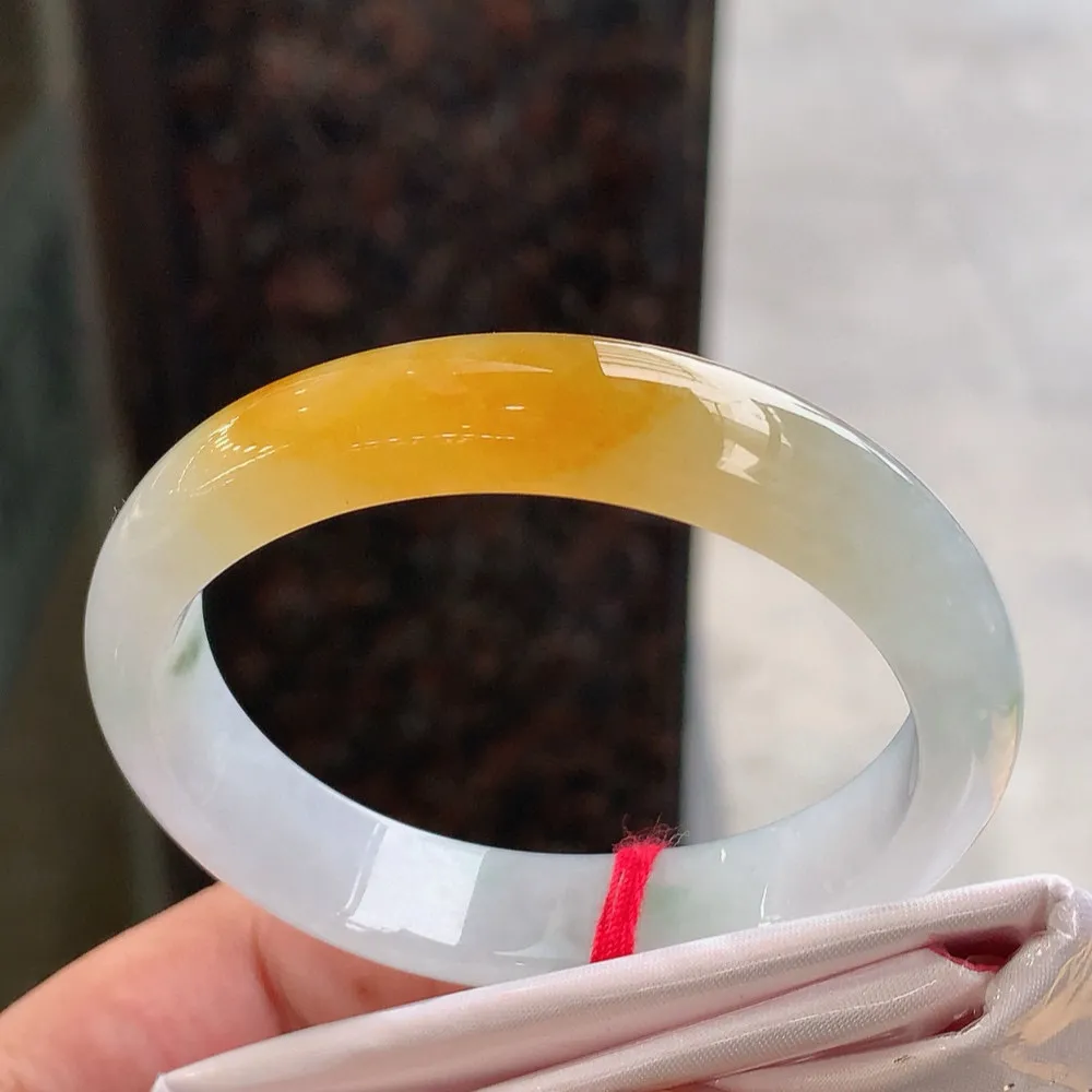 贵妃高冰黄翡飘花 无瑕 尺寸:55.1/46.4/11.5/7.2 种色俱佳