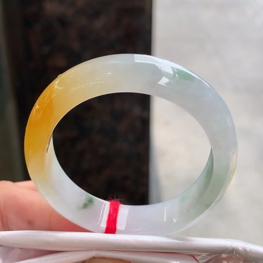 贵妃高冰黄翡飘花 无瑕 尺寸:55.1/46.4/11.5/7.2 种色俱佳