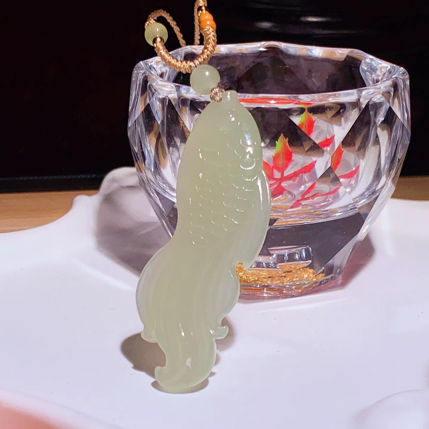 和田玉晴水年年有余鱼挂件。尺寸58/20/6重11.3克 无裂无杂 玉质细腻油润 底色纯净 脂粉好，