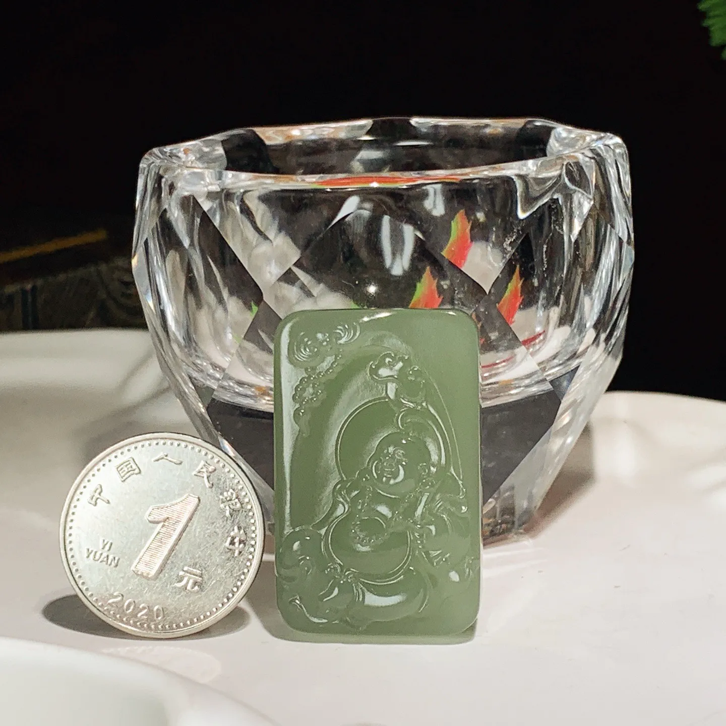 和田玉晴水佛引福来牌子挂件。尺寸35/22/9重16.9克 玉质细腻油润 脂粉好，品质好。lt251030