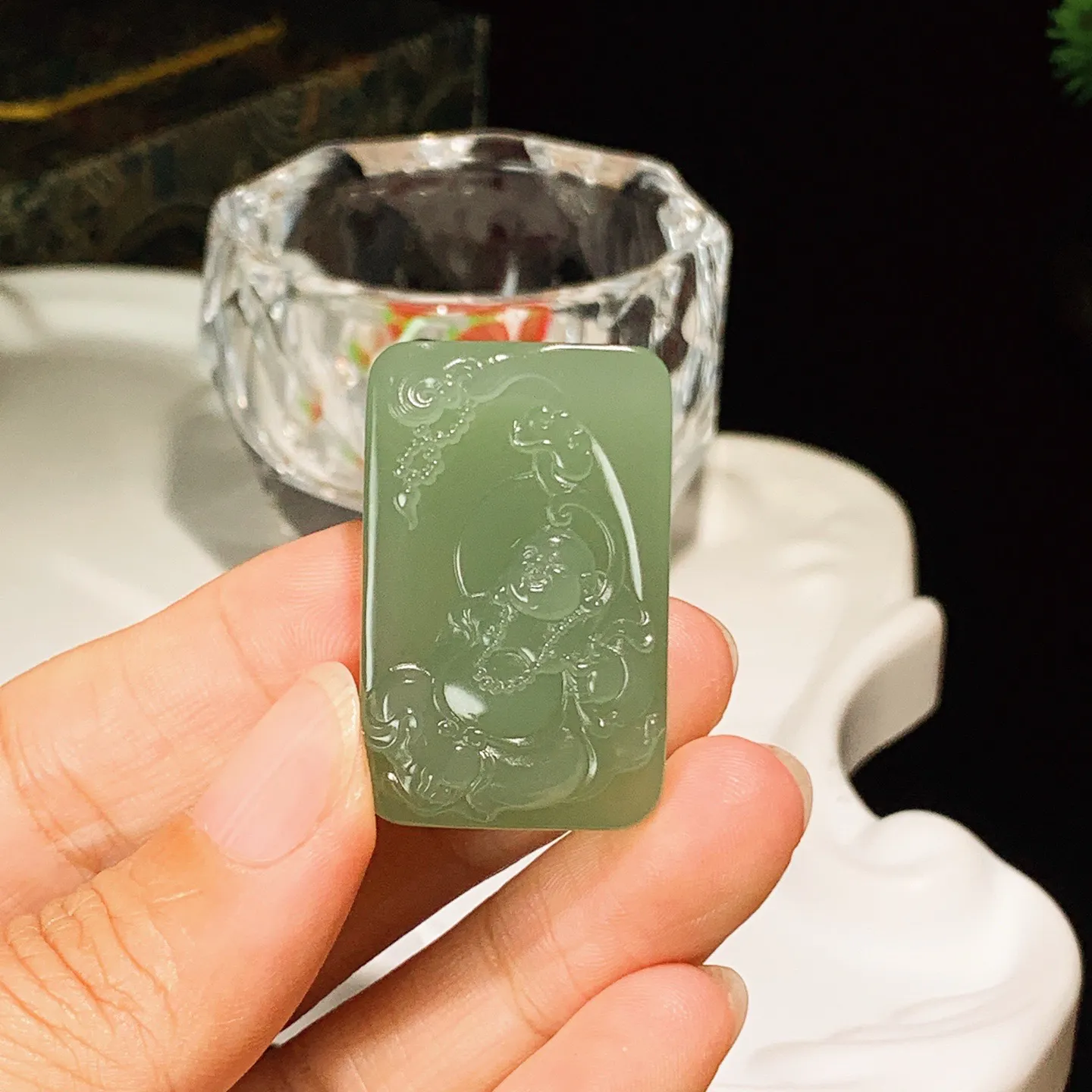 和田玉晴水佛引福来牌子挂件。尺寸35/22/9重16.9克 玉质细腻油润 脂粉好，品质好。lt251030