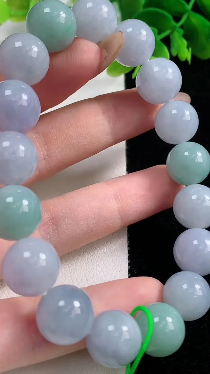 天然A货翡翠春带彩紫罗兰圆珠手串，尺寸12-17颗，重量:53.68g11月2日
工厂直销收藏佳品,