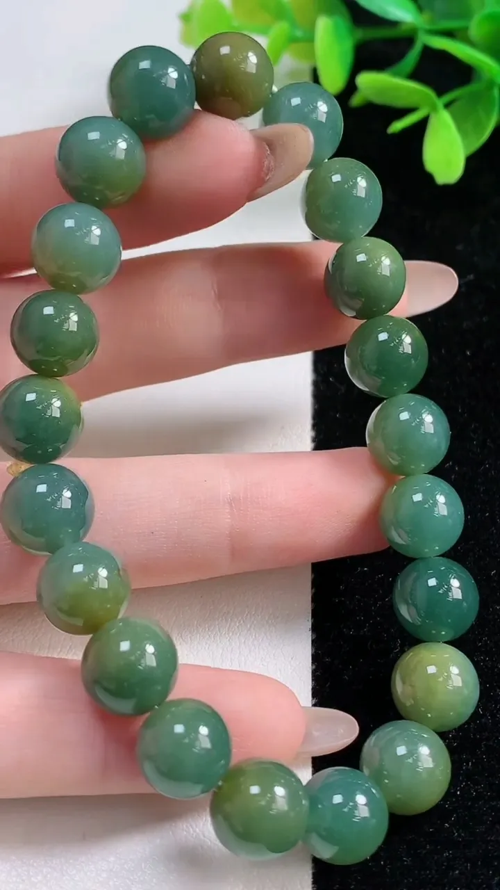天然A货翡翠货蓝水双彩圆珠手串21颗，尺寸9.8，重:33.51g11月4日
工厂直销收藏佳品,种好