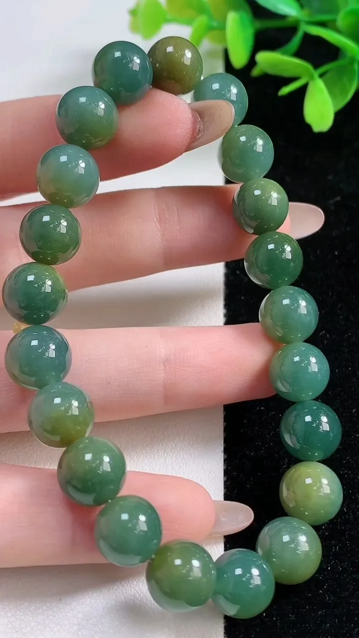 天然A货翡翠货蓝水双彩圆珠手串21颗，尺寸9.8，重:33.51g11月4日
工厂直销收藏佳品,种好