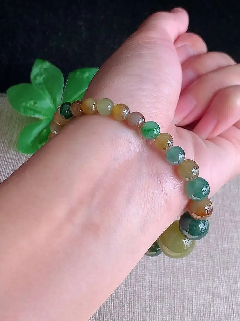 a货翡翠老坑冰种多彩圆珠佛珠手串27颗  尺寸14.5/5.8/11mm 重量22.00g 1105