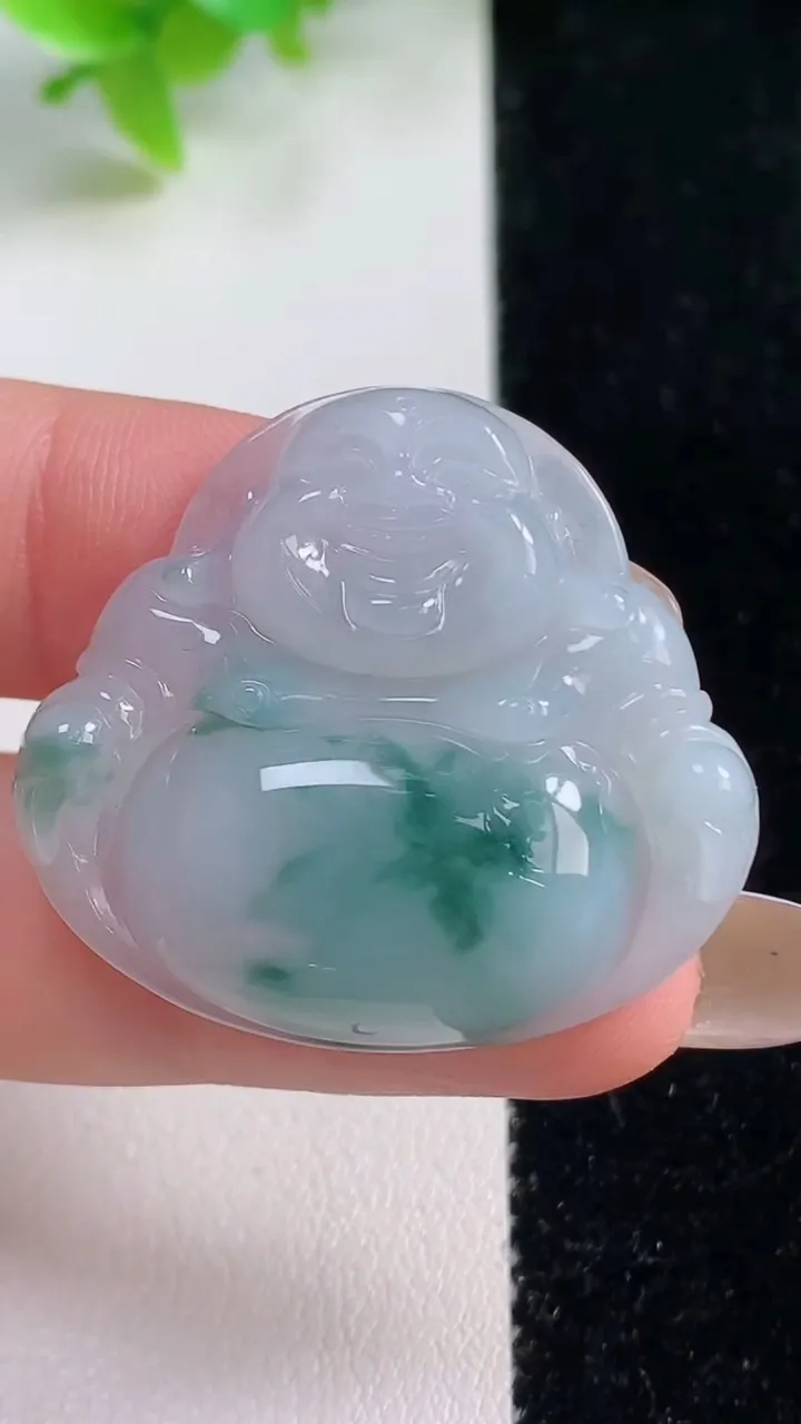 天然A货翡翠冰种飘花佛公吊坠，尺寸30.5-33.7-5.9，重量:9.07g
11月7日