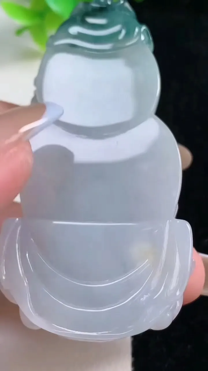 天然A货翡翠双彩飘花大势至观音菩萨吊坠，尺寸70.6-36.3-10.5，重量:40.69g
11月7日