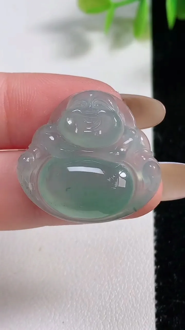 天然A货翡翠冰种飘花佛公吊坠，尺寸25.2-27.2-5.7，重量:5.31g
11月10日