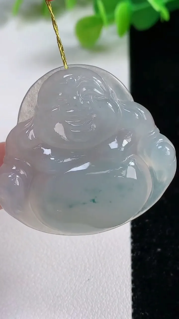 天然A货翡翠冰种飘花佛公吊坠，尺寸35.6-38.3-6.5，重量:12.45g
11月12日