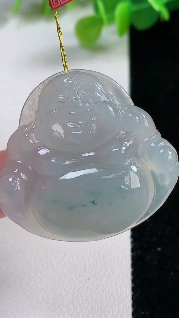 天然A货翡翠冰种飘花佛公吊坠，尺寸35.6-38.3-6.5，重量:12.45g
11月12日