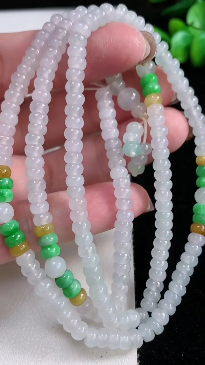 天然A货翡翠三彩算盘珠项链，尺寸4.8-2.4-206颗，重量:34.59g11月14日
工厂直销收藏佳品,种好水足，色泽均匀，有种有色，上手高大气！