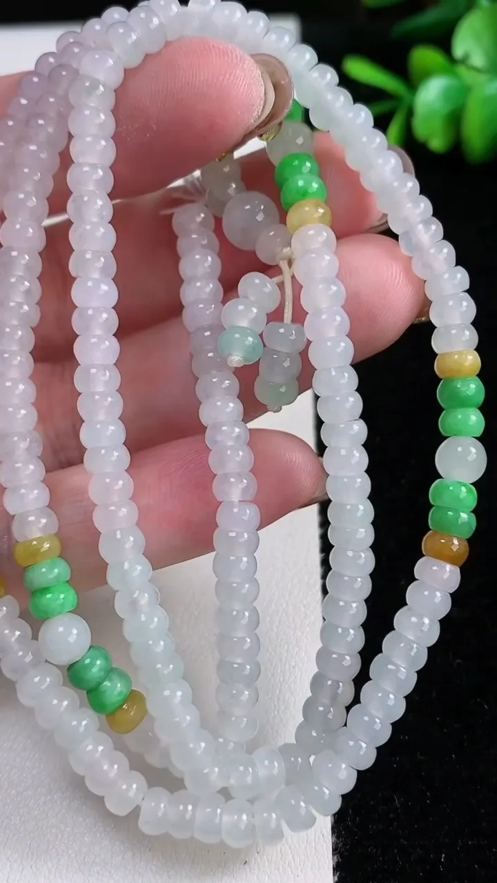 天然A货翡翠三彩算盘珠项链，尺寸4.8-2.4-206颗，重量:34.59g11月14日
工厂直销收藏佳品,种好水足，色泽均匀，有种有色，上手高大气！