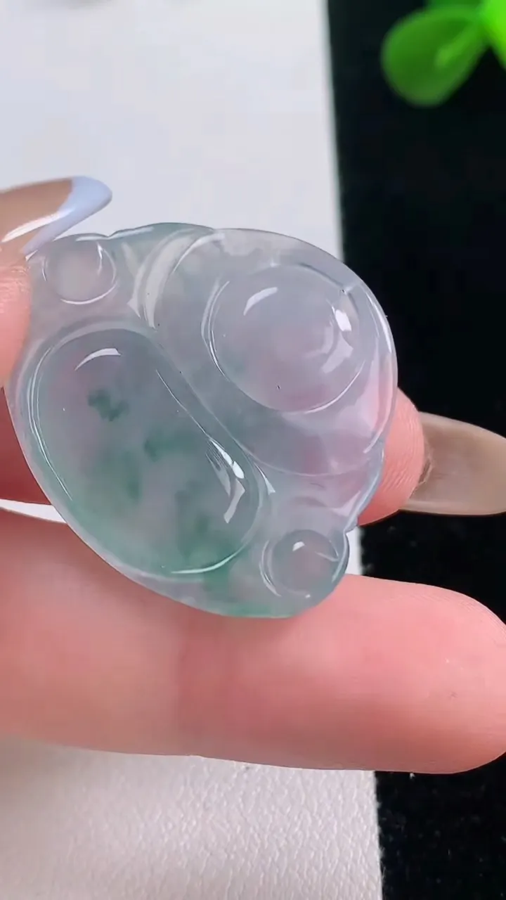 天然A货翡翠冰种飘花佛公镶嵌件，尺寸27.7-32.4-5.6，重量:7.85g
11月19日