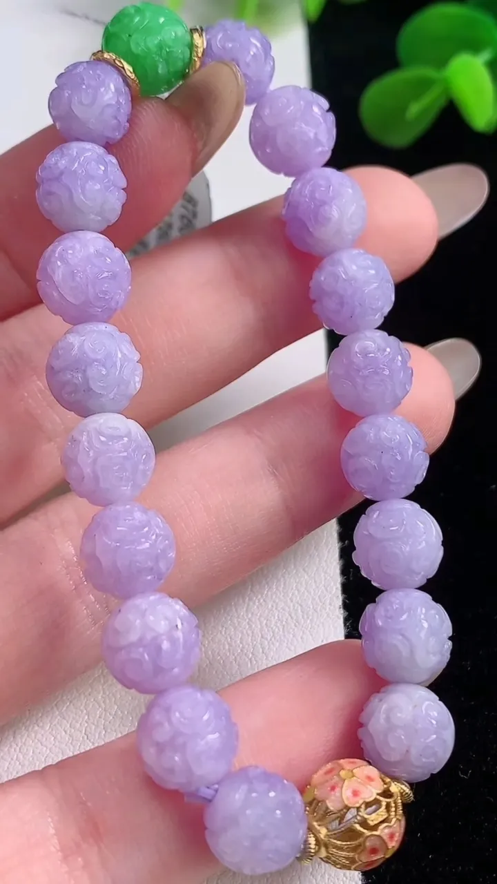 天然A货翡翠双彩紫罗兰圆珠雕花圆珠手串，尺寸8.5-19颗，重量:18.31g11月19日
工厂直销收藏佳品,种好水足，色泽均匀，有种有色，上手高大气！