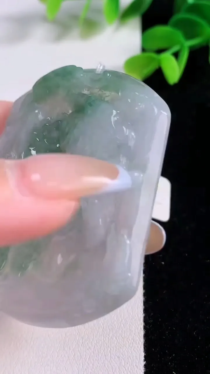 天然A货翡翠生肖虎吊坠，尺寸56.2-46.3-5.3，重量:30.24g
11月21日