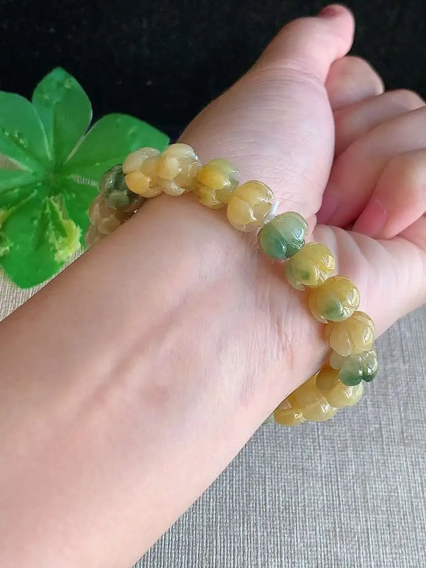a货翡翠老坑冰种黄翡飘花莲蓬手串22颗，尺寸9.8×7mm 重量28.54g 1121