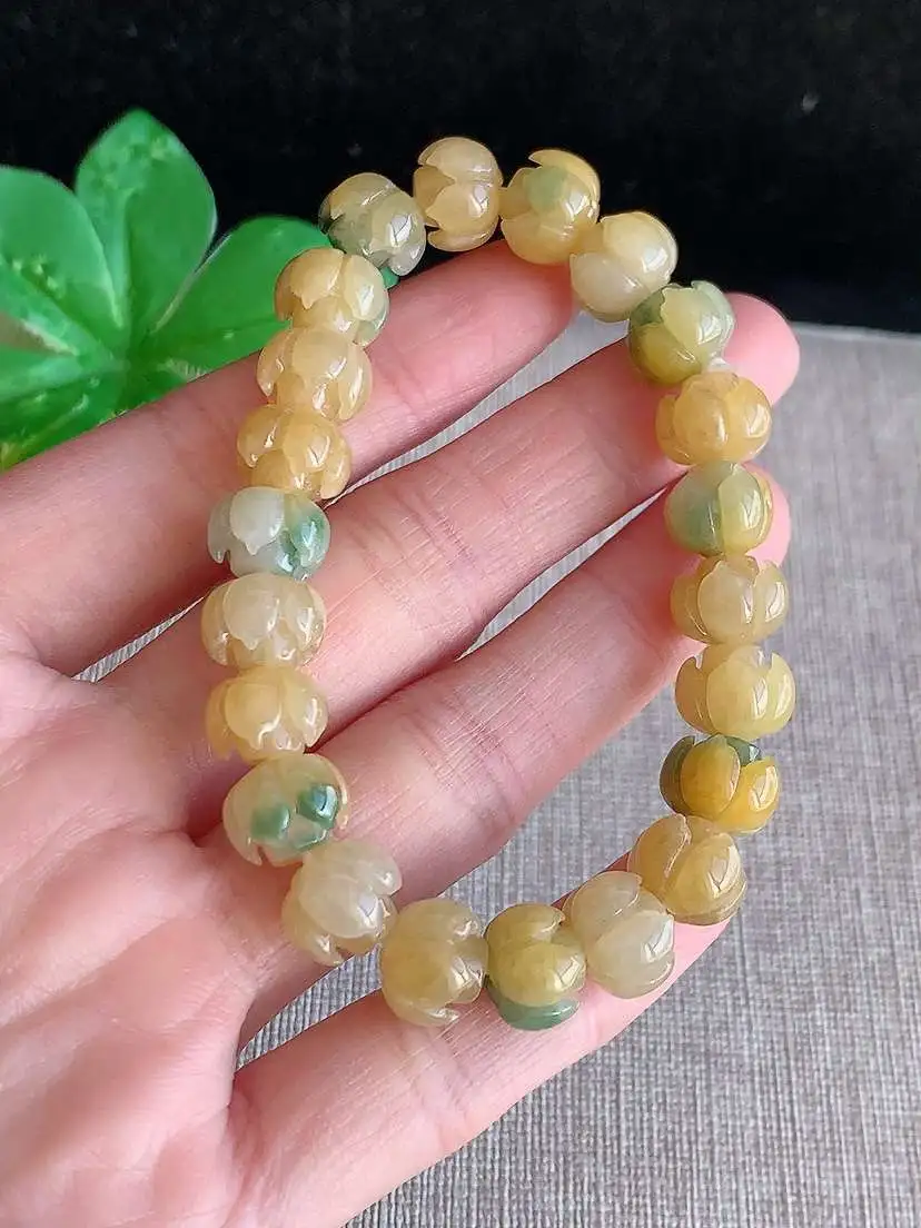 a货翡翠老坑冰种黄翡飘花莲蓬手串22颗，尺寸9.8×7mm 重量28.54g 1121