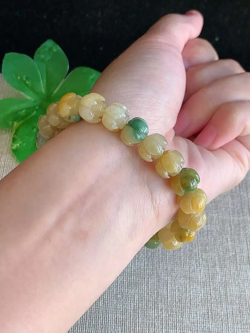 a货翡翠老坑冰种黄翡飘花莲蓬手串22颗，尺寸9.8×7mm 重量28.54g 1121