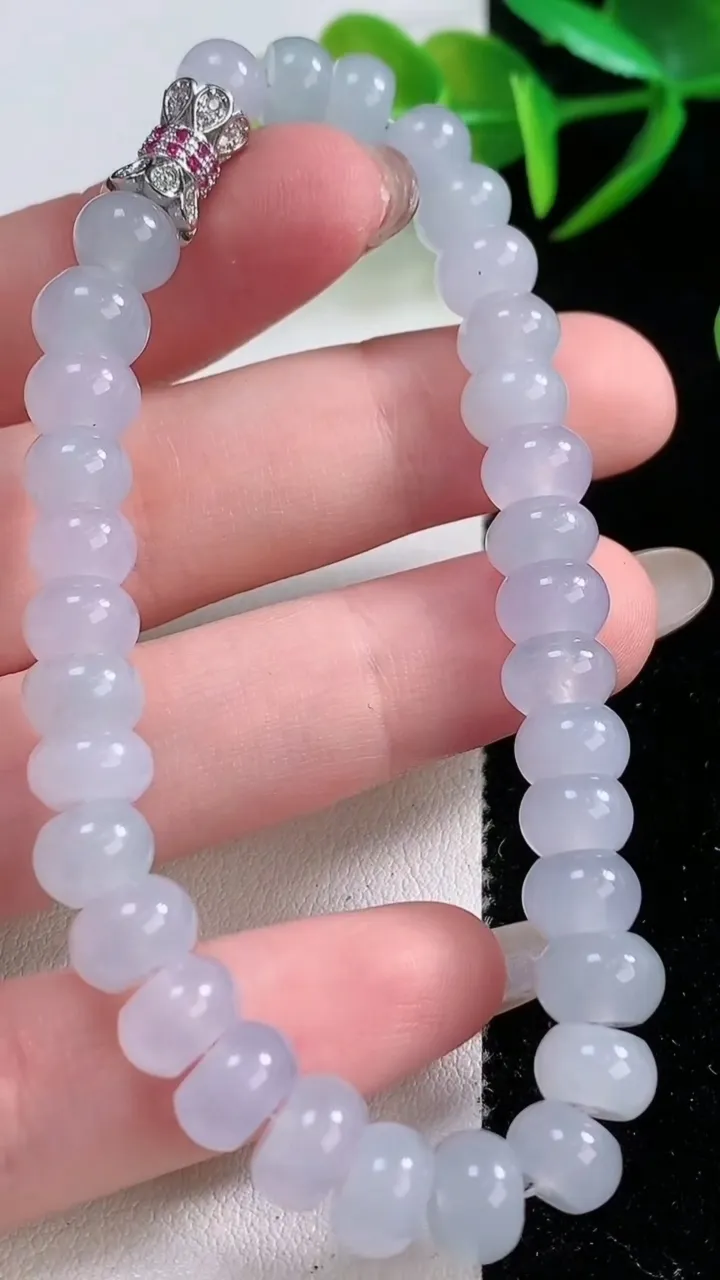 天然A货翡翠紫罗兰算盘珠手串，尺寸7.5-4.8-33颗，重量:22.16g11月26日
工厂直销收藏佳品,种好水足，色泽均匀，有种有色，上手高大气！