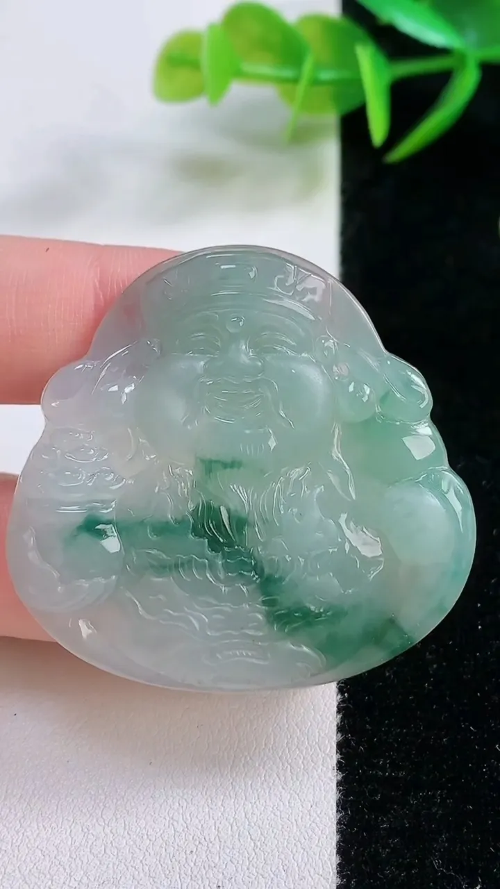天然A货翡翠飘花财神爷吊坠，尺寸41.7-43.7-5.5，重量:20.13g
11月26日