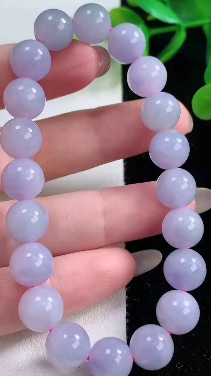 天然A货翡翠紫罗兰圆珠手串，尺寸9.6-9-20颗，重量:有30.92g11月26日
工厂直销收藏佳品,种好水足，色泽均匀，有种有色，上手高大气！
