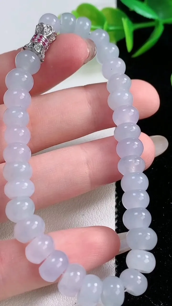 天然A货翡翠紫罗兰算盘珠手串，尺寸7.5-4.8-33颗，重量:22.16g11月26日
工厂直销收