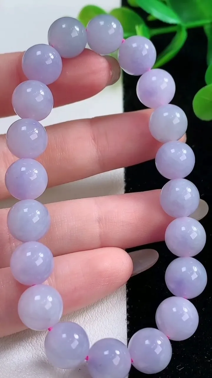 天然A货翡翠紫罗兰圆珠手串，尺寸9.6-9-20颗，重量:有30.92g11月26日
工厂直销收藏佳品,种好水足，色泽均匀，有种有色，上手高大气！