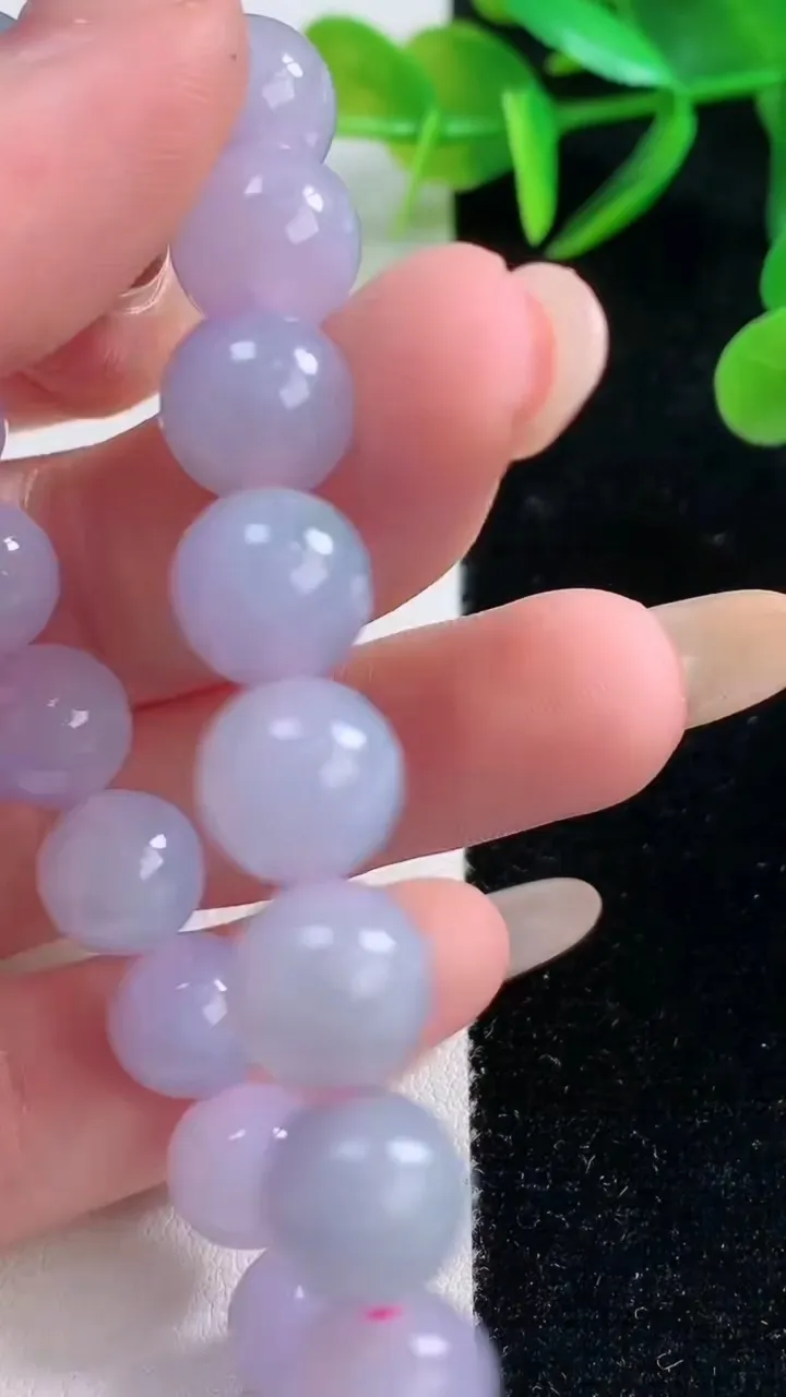 天然A货翡翠紫罗兰圆珠手串，尺寸9.6-9-20颗，重量:有30.92g11月26日
工厂直销收藏佳品,种好水足，色泽均匀，有种有色，上手高大气！