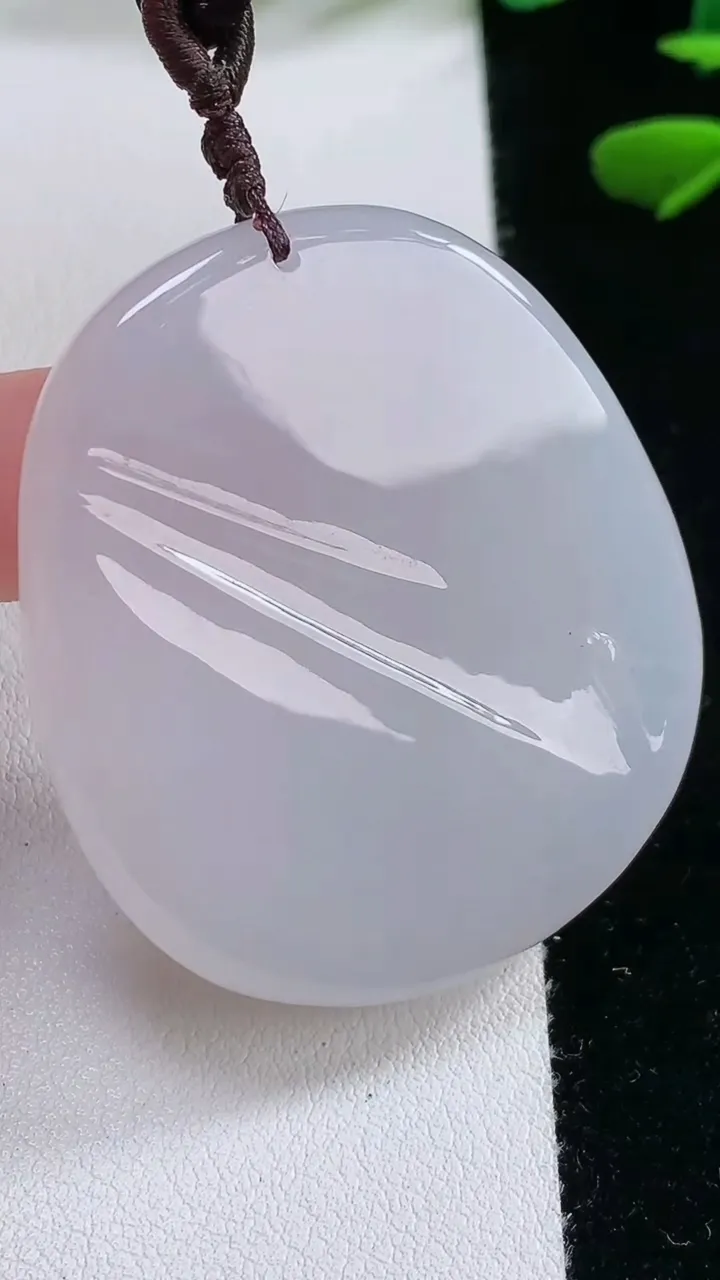 天然A货翡翠白冰悟道吊坠，尺寸 45.5-39.5-6，重:31.99g
11月27日