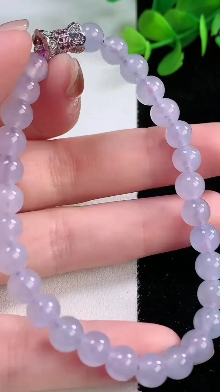 天然A货翡翠紫罗兰圆珠手串，尺寸6.5-29颗，重量:15.12g11月29日
工厂直销收藏佳品,种好水足，色泽均匀，有种有色，上手高大气！