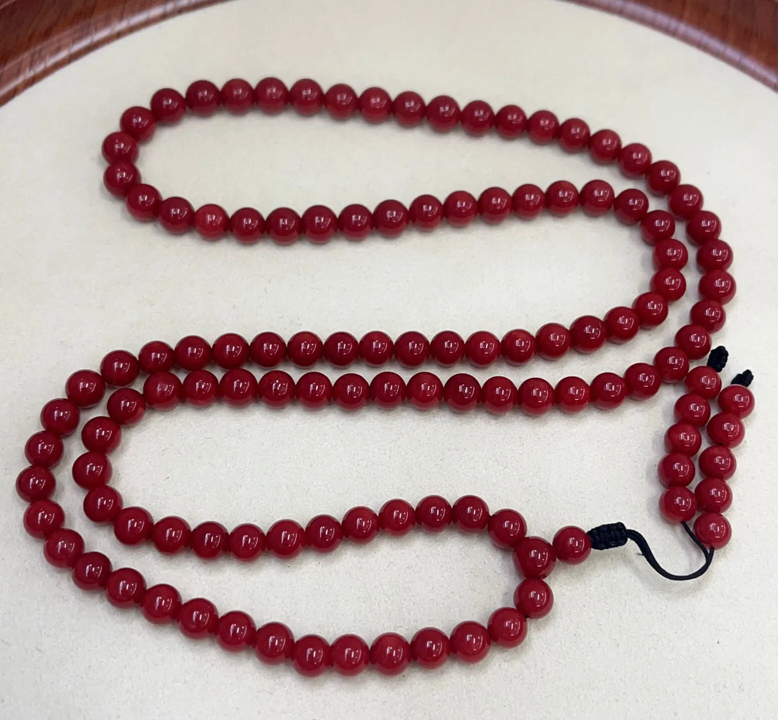 【天然牛血红珊瑚7mm圆珠108大佛珠串】传承精品！项链手链两用款！西班牙产地，科西卡材料，牛血红颜色，珠子直径7.1-6.3mm左右！108粒加佛头弟子珠共120粒，可作念佛珠串，每料珠子均为天然珊瑚，珊瑚自古就为佛教珍宝，大师，高僧的喜爱之物！可加持，可守护！深海千年有机宝石，重量46.88克！
