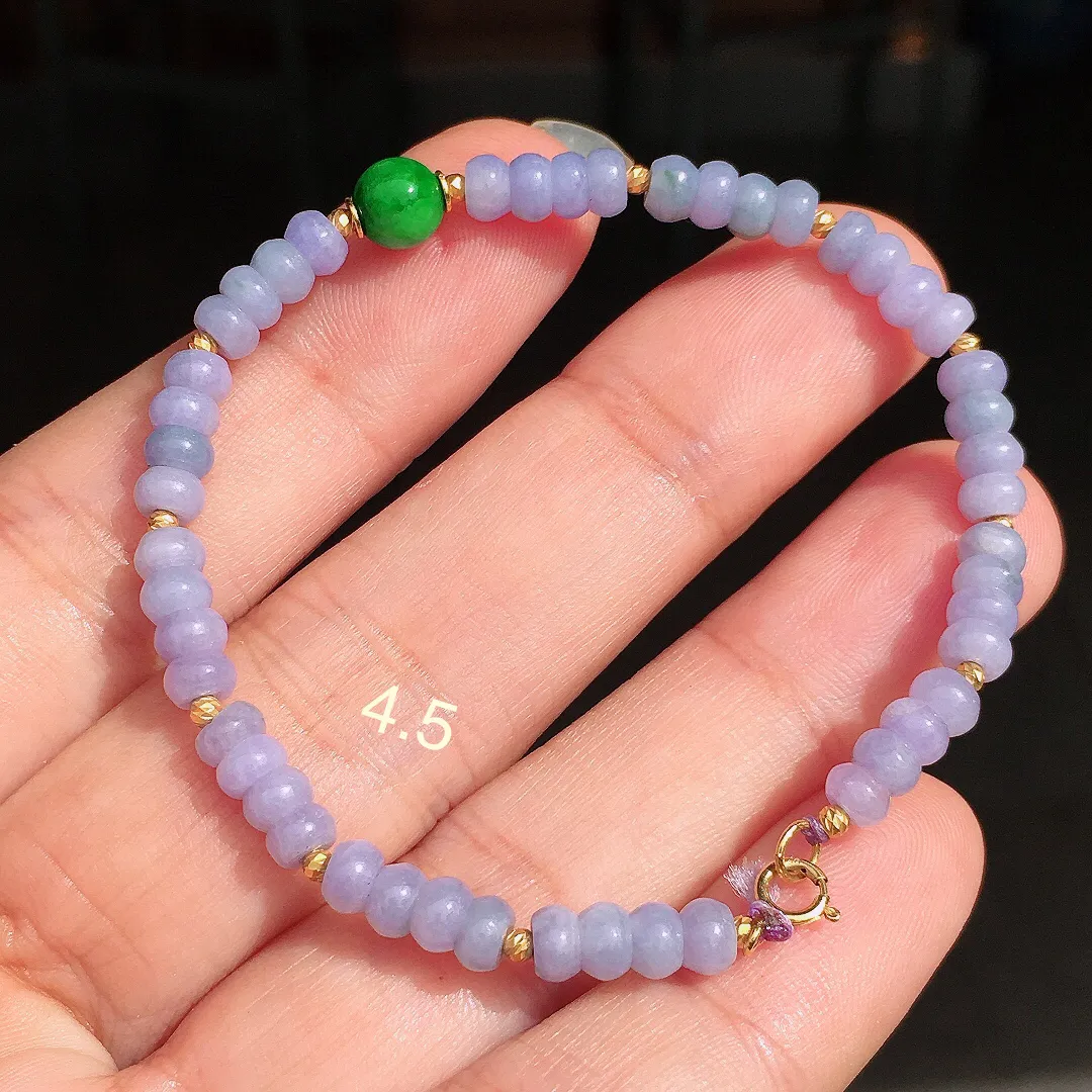 紫罗兰珠子手串，色泽均匀艳丽，玉质细腻，荧光感超
强，饱满圆润，尽显优雅气质，18k
金豪华镶嵌