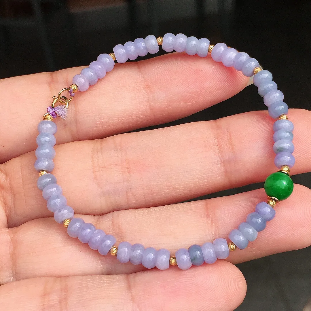 紫罗兰珠子手串，色泽均匀艳丽，玉质细腻，荧光感超
强，饱满圆润，尽显优雅气质，18k
金豪华镶嵌