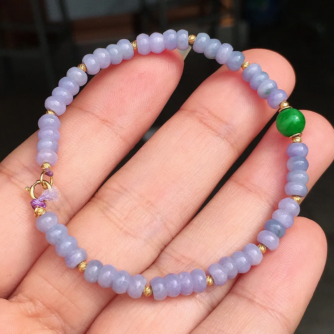 紫罗兰珠子手串，色泽均匀艳丽，玉质细腻，荧光感超
强，饱满圆润，尽显优雅气质，18k
金豪华镶嵌