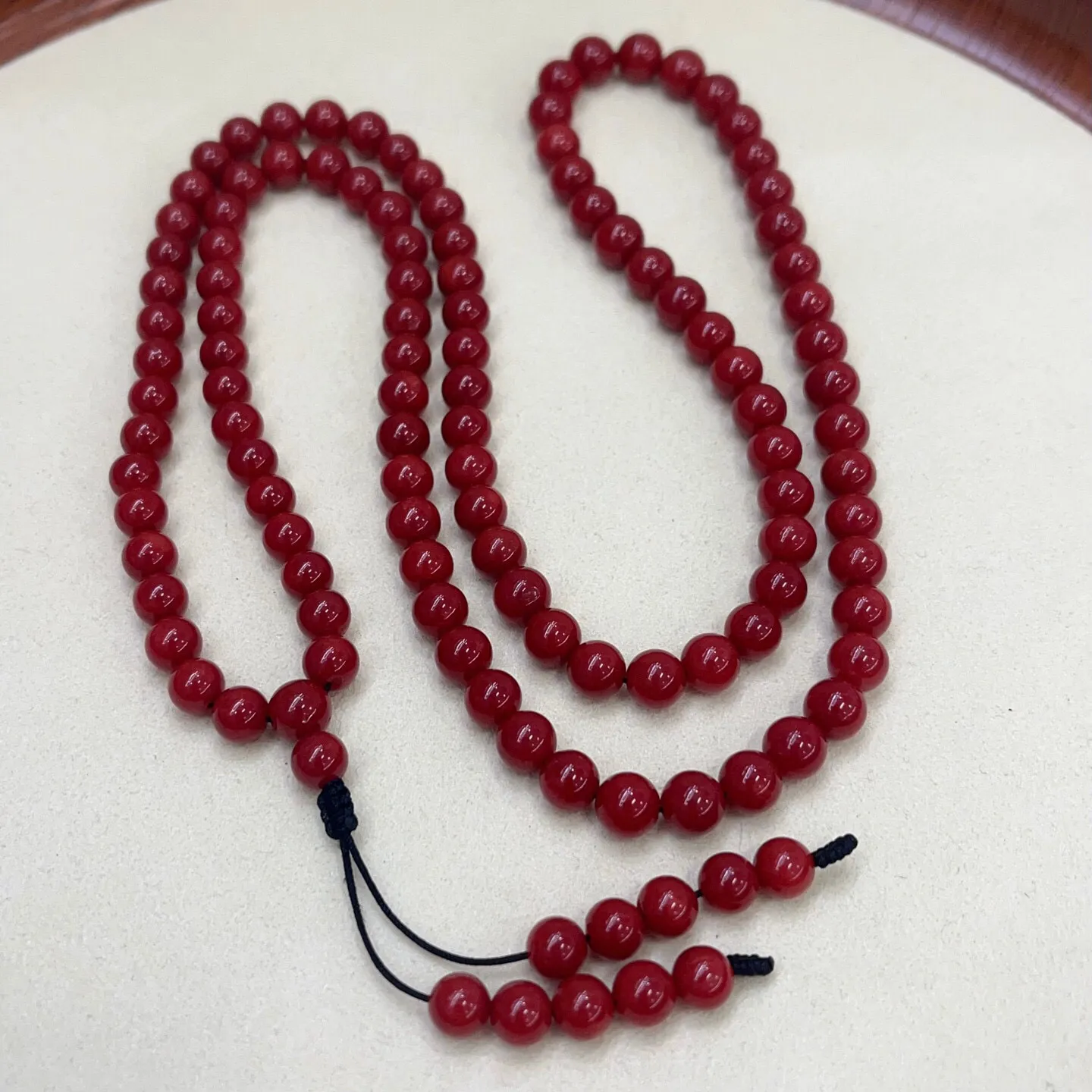 【天然牛血红珊瑚7mm圆珠108大佛珠串】传承精品！项链手链两用款！西班牙产地，科西卡材料，牛血红颜色，珠子直径7.1-6.3mm左右！108粒加佛头弟子珠共120粒，可作念佛珠串，每料珠子均为天然珊瑚，珊瑚自古就为佛教珍宝，大师，高僧的喜爱之物！可加持，可守护！深海千年有机宝石，重量46.88克！