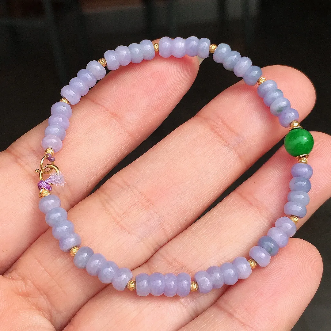 紫罗兰珠子手串，色泽均匀艳丽，玉质细腻，荧光感超
强，饱满圆润，尽显优雅气质，18k
金豪华镶嵌