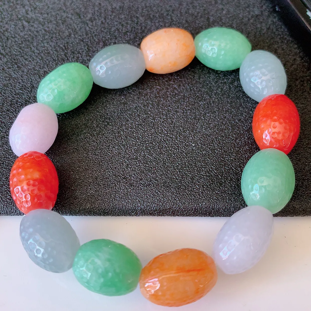 自然光实拍，冰润多宝翡翠核桃手链，多彩路路通翡翠手串，颜色丰富，料子细腻，高档大气，自戴送礼佳品！#46.7取一尺寸15*10.8mm