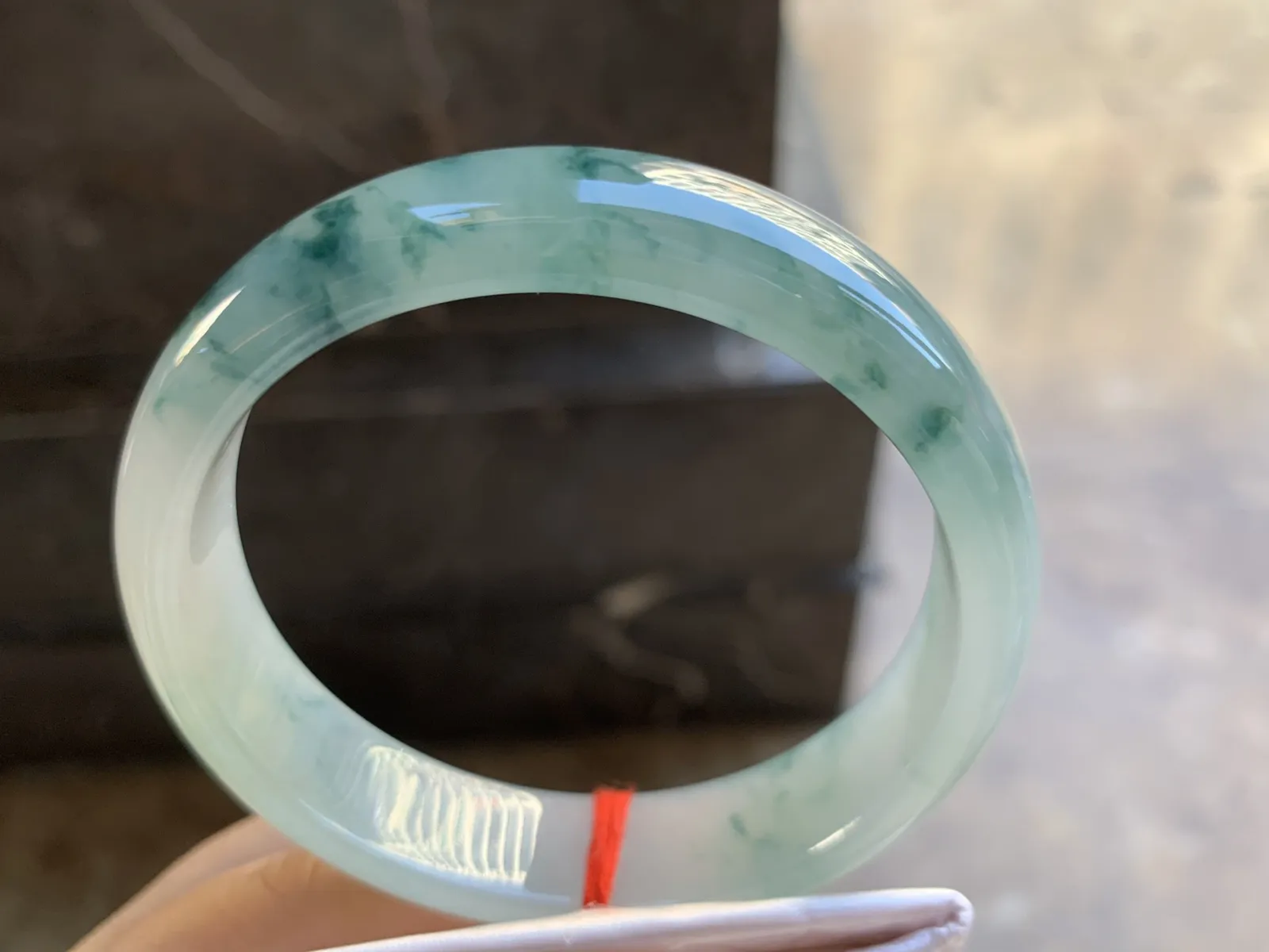 58-14.3-7.2mm
冰种飘花手镯 水润光泽 花色灵动